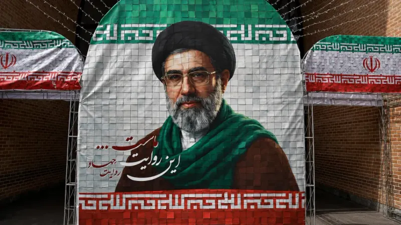 West Asia war updates showing an Iranian supreme leader banner in Tehran