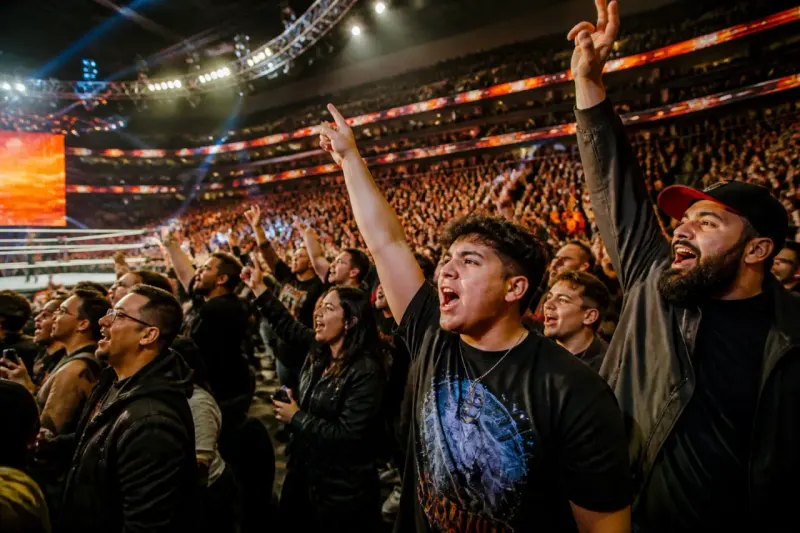 A packed arena during the WWE SummerSlam Night 1 Matches with fans cheering