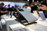 Close-up of premium flagship smartphones on display at a tech event