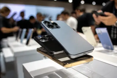 Close-up of premium flagship smartphones on display at a tech event
