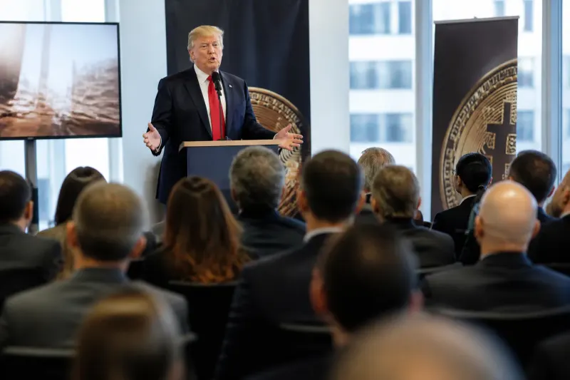 President Trump speaking at a podium about cryptocurrency