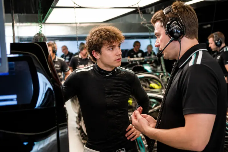 Kimi Antonelli reviewing his performance with his team